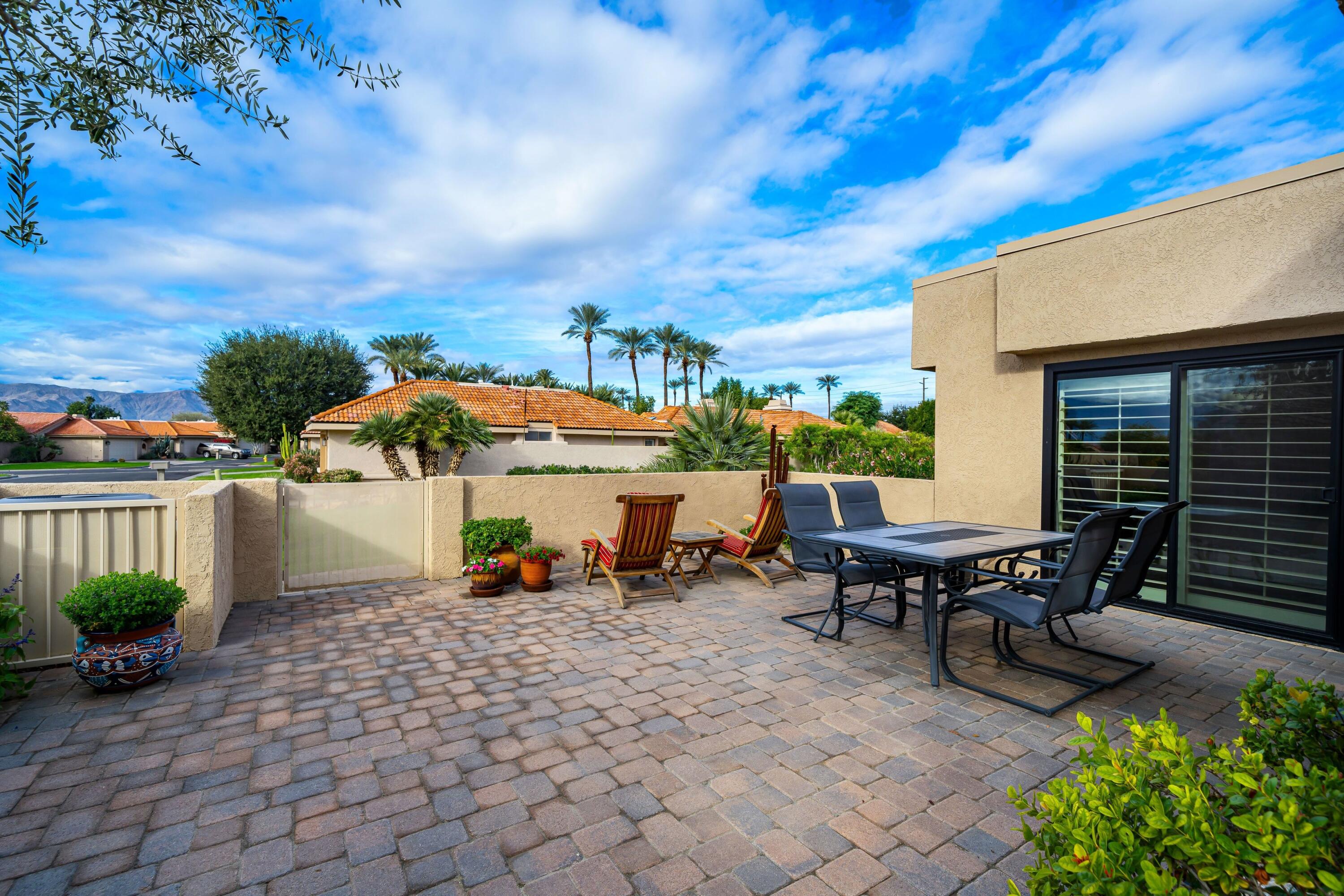 29 Verde Way Palm Desert, CA 92260 - Photo 25 of 43 a view of a terrace with sitting area