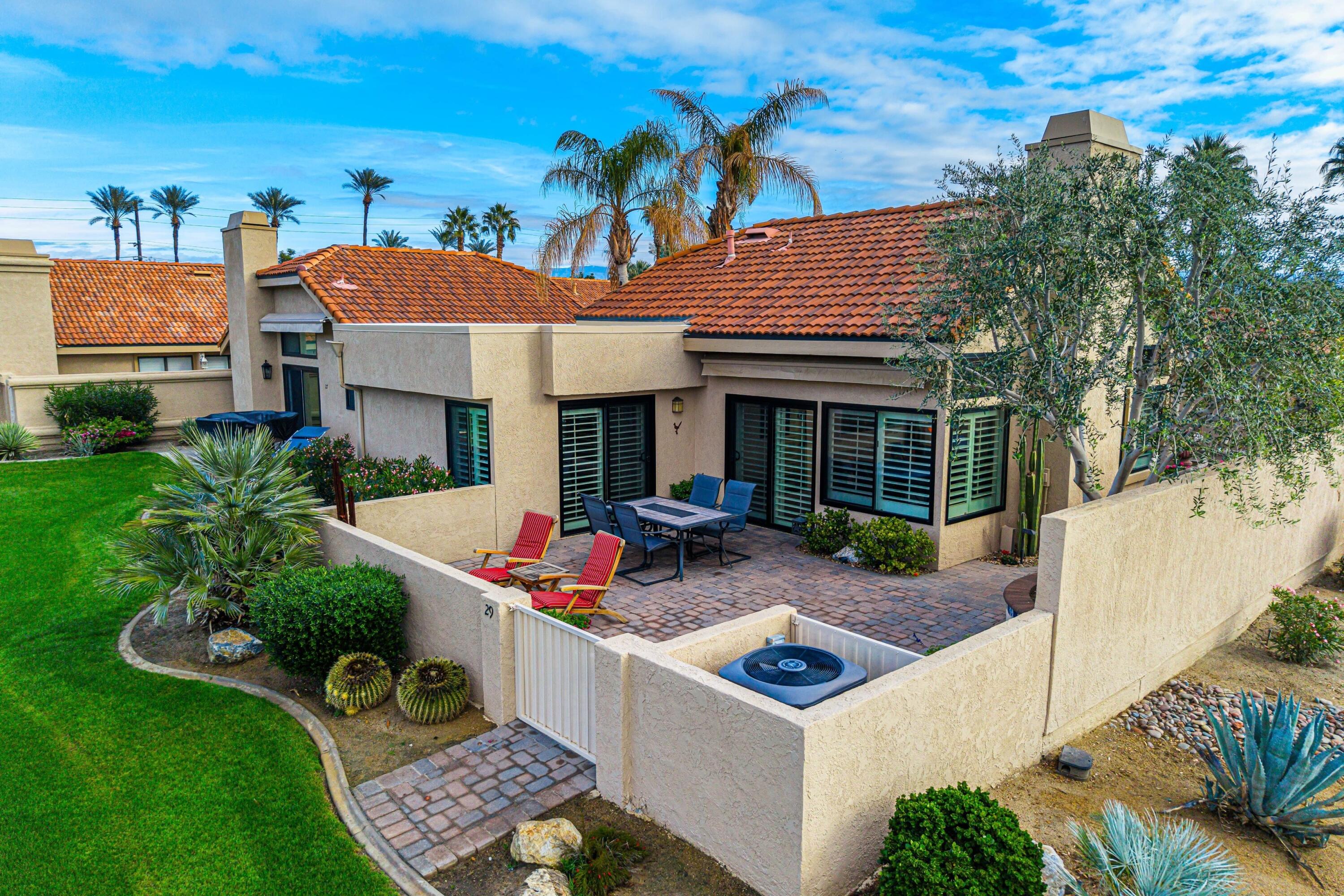 29 Verde Way Palm Desert, CA 92260 - Photo 29 of 43 a view of a house with backyard and sitting area