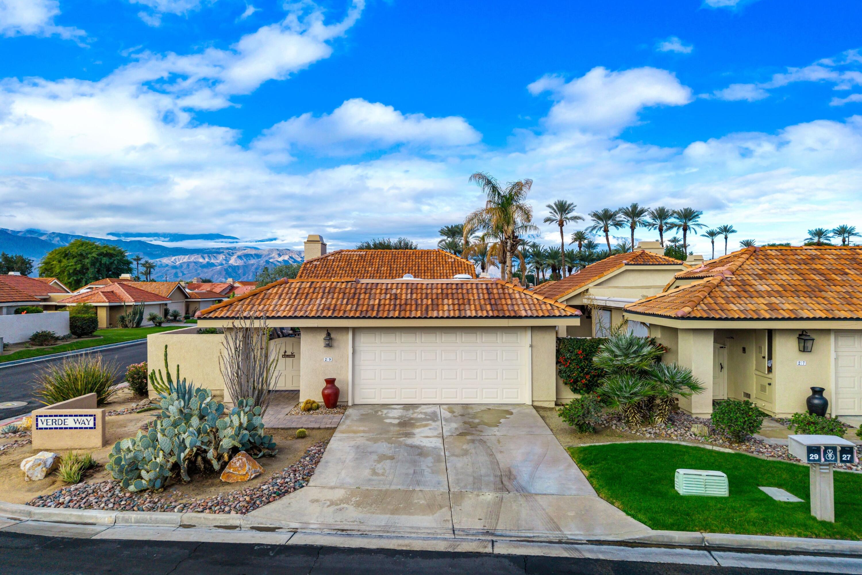 29 Verde Way Palm Desert, CA 92260 - Photo 32 of 43 a front view of a house with garden