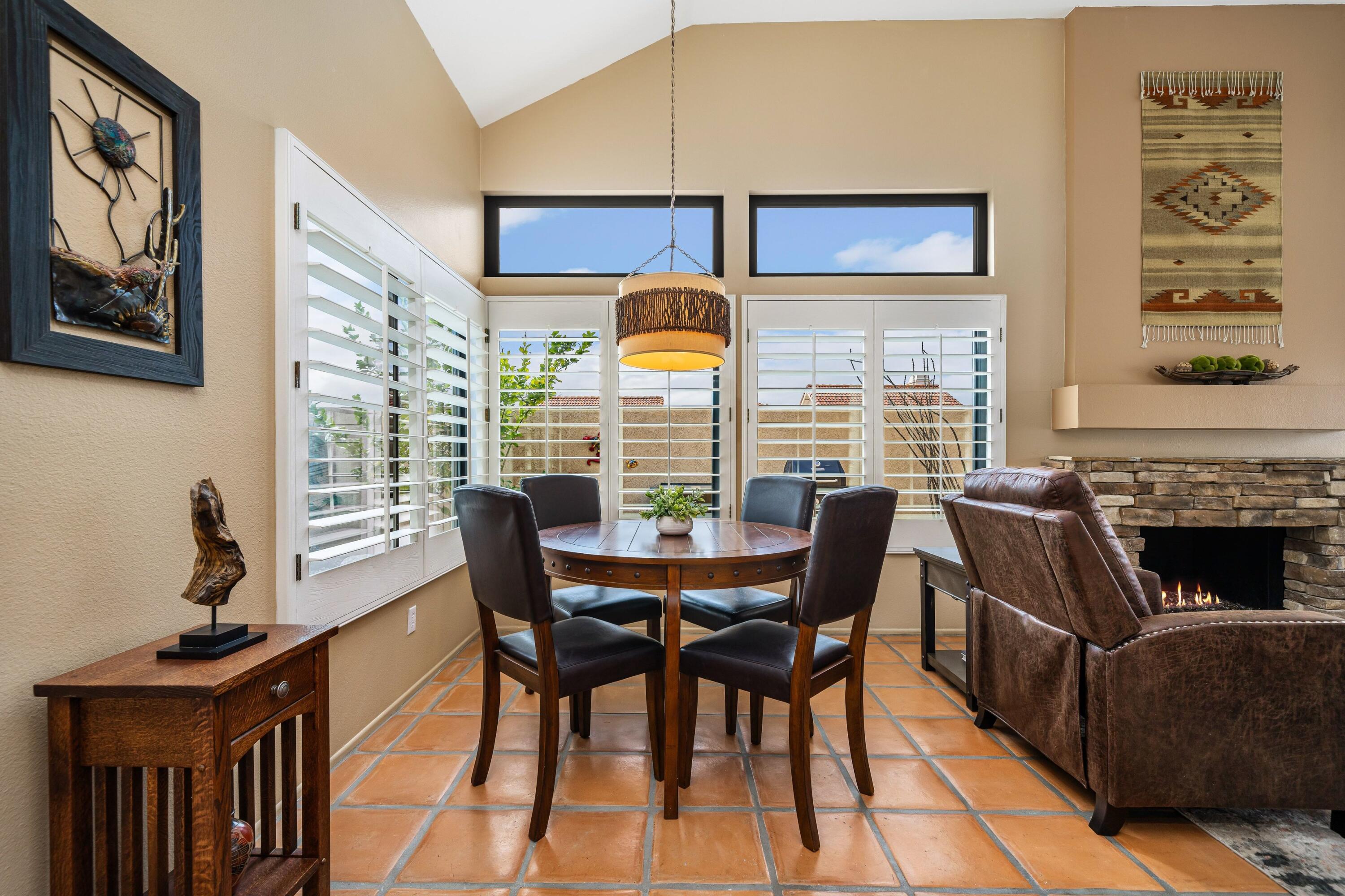 29 Verde Way Palm Desert, CA 92260 - Photo 10 of 43 a view of a dining room with furniture window and outside view