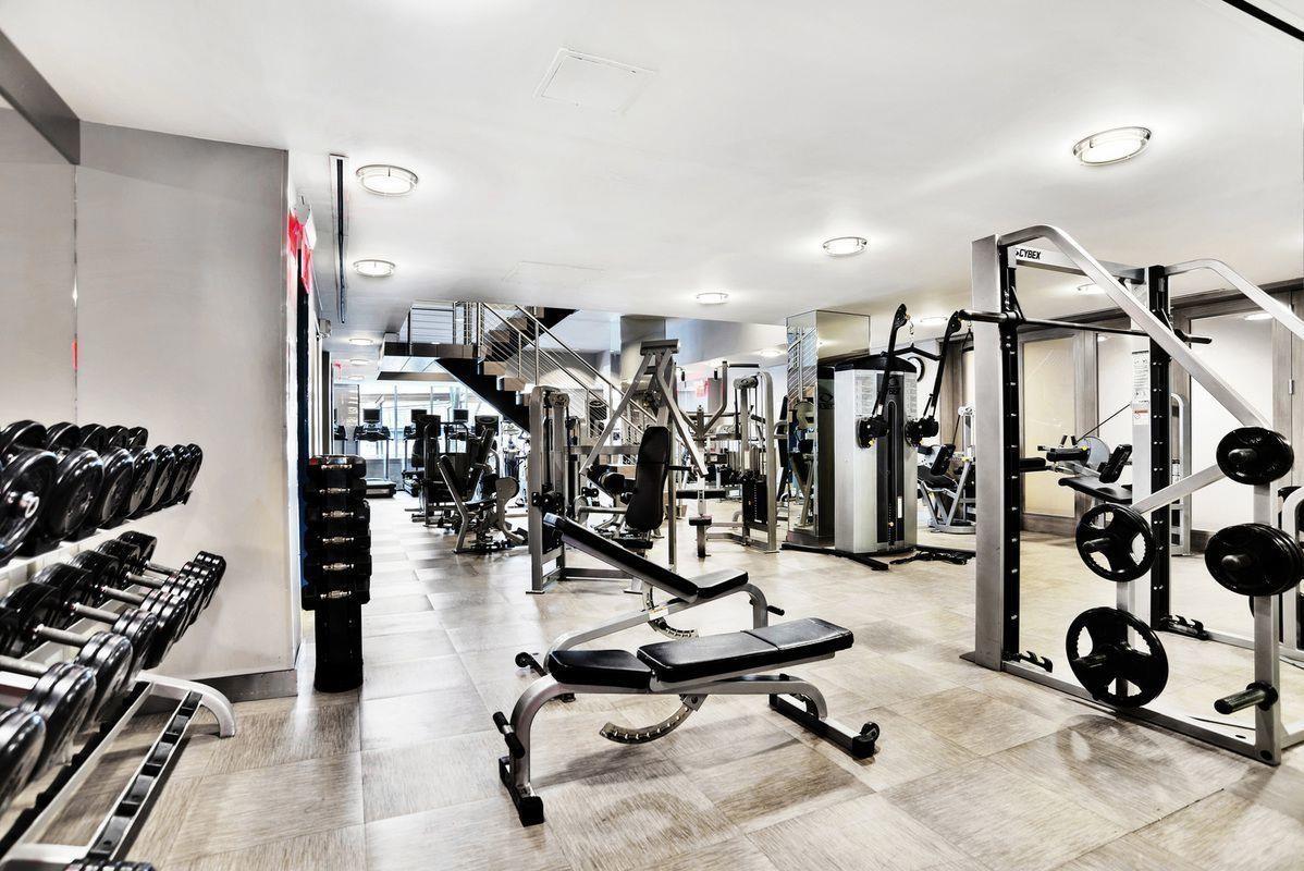 225 Rector Place, Unit 2DD Manhattan, NY 10280 - Photo 6 of 12 a view of a room with gym equipment