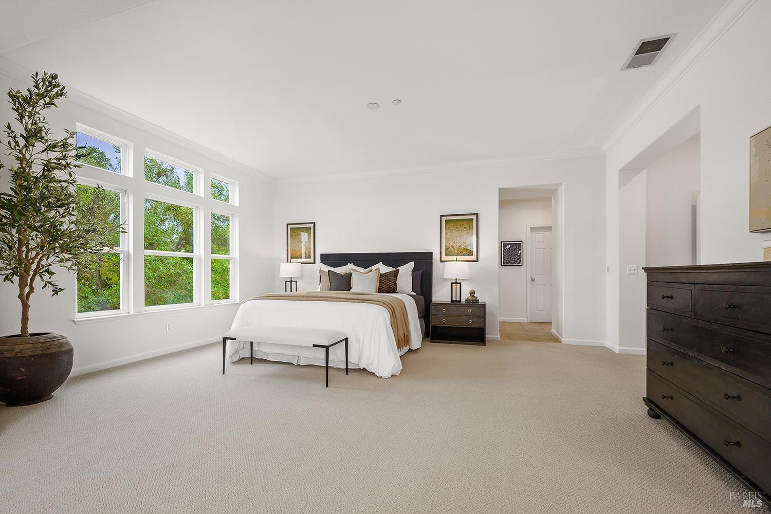 38 Maybeck Street Novato, CA 94949 - Photo 30 of 47 a spacious bedroom with a bed and a large window