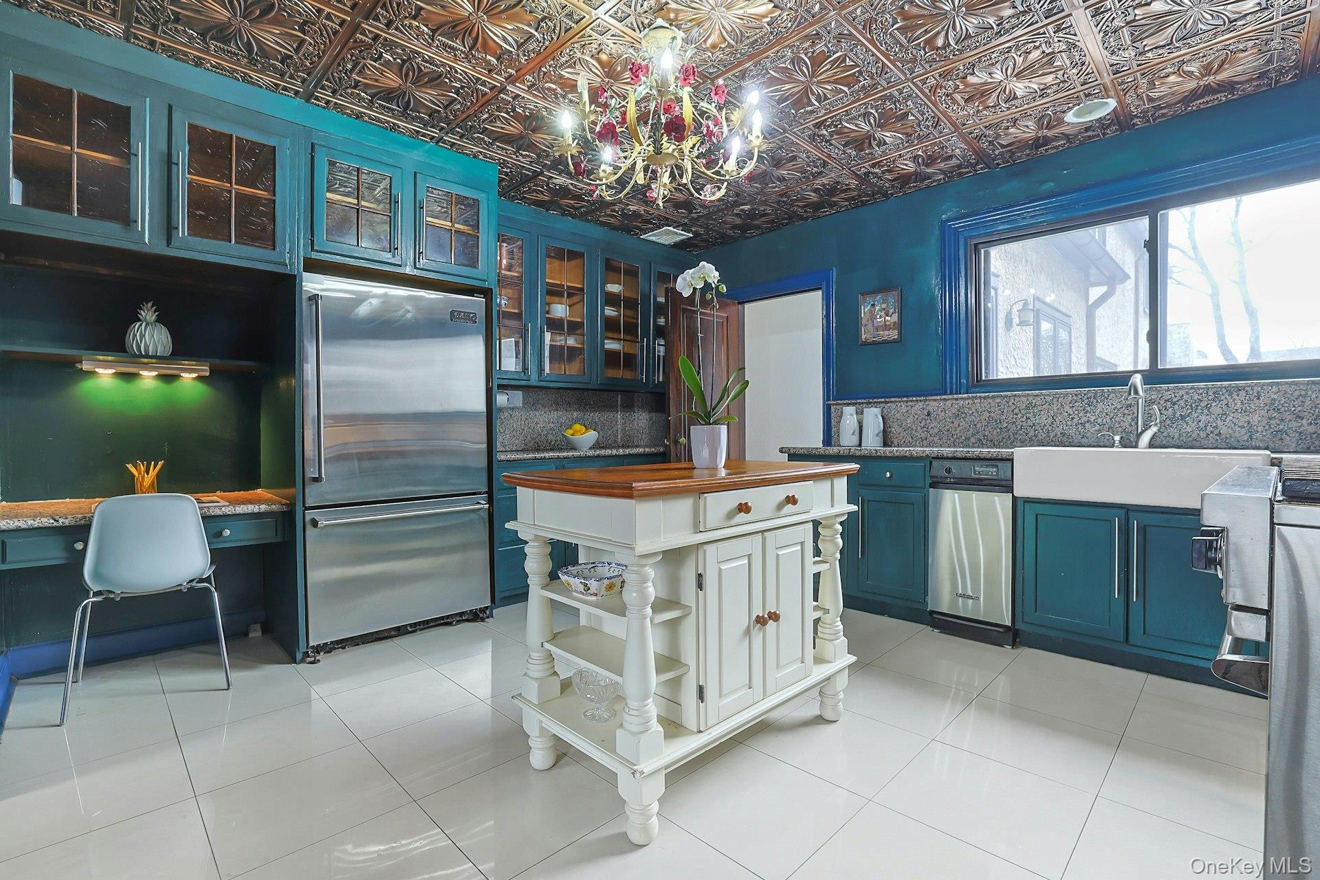 66 Mamaroneck Road Scarsdale, NY 10583 - Photo 16 of 47 Designed for serious cooking, this side of the kitchen showcases Viking appliances, generous prep space, and abundant storage framed by rich color and texture.