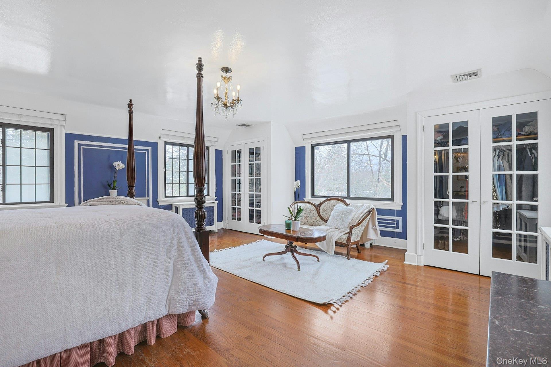 66 Mamaroneck Road Scarsdale, NY 10583 - Photo 22 of 47 Offering a serene and private setting, the primary suite includes a sitting area and easy access to ample closet space and the ensuite bath.