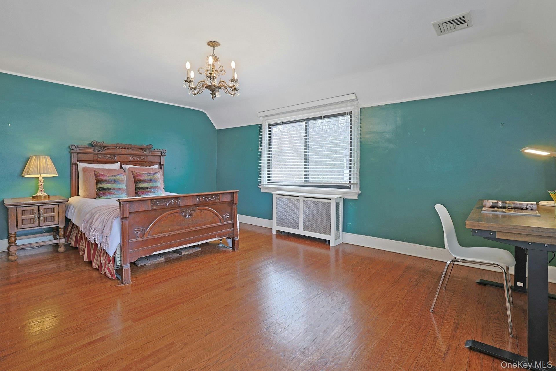 66 Mamaroneck Road Scarsdale, NY 10583 - Photo 25 of 47 A generously sized family bedroom with ample light and hardwood floors, conveniently located near the shared hall bath.