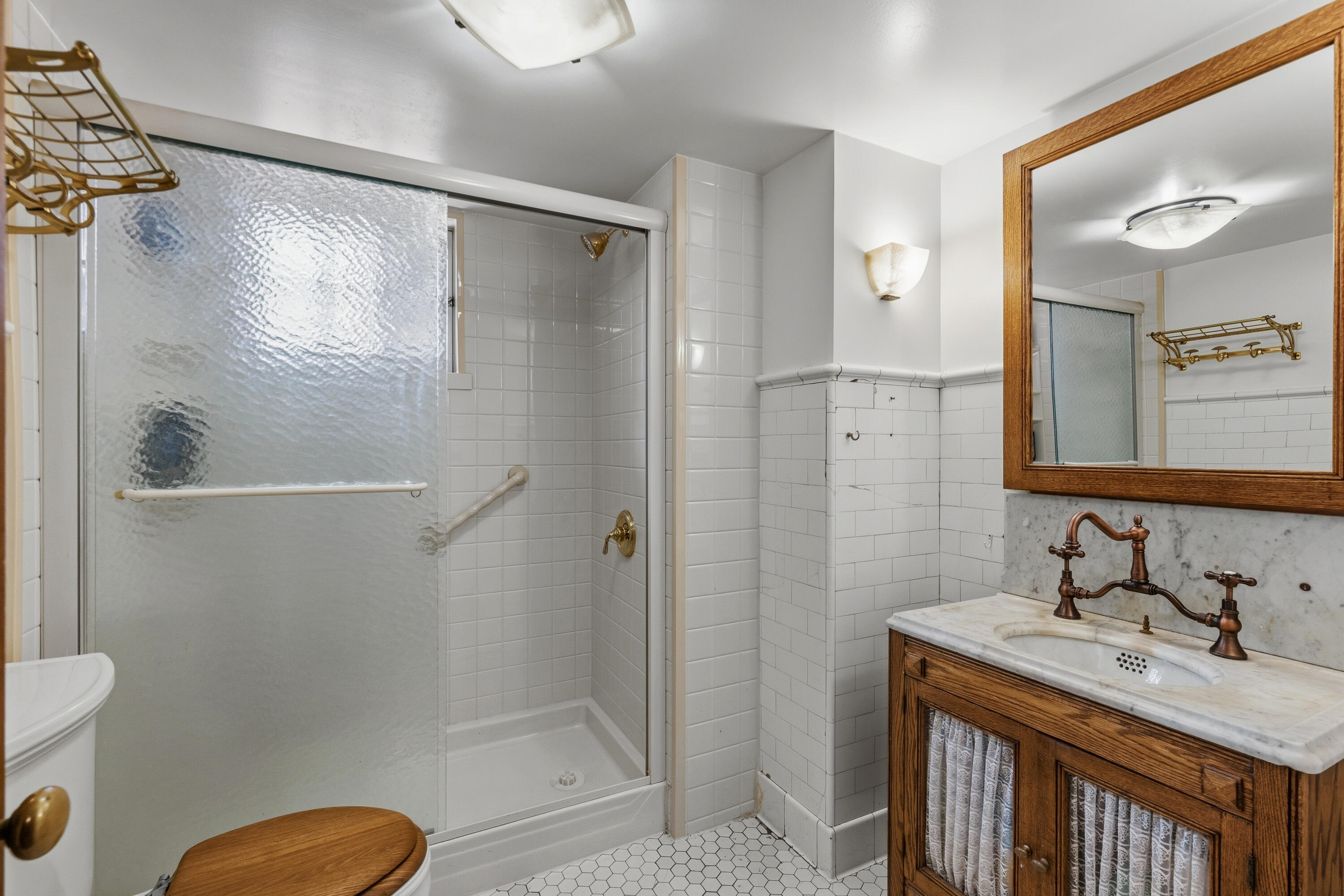 6789 North Elm Tree Road Glendale, WI 53217 - Photo 18 of 34 1st Floor Bathroom