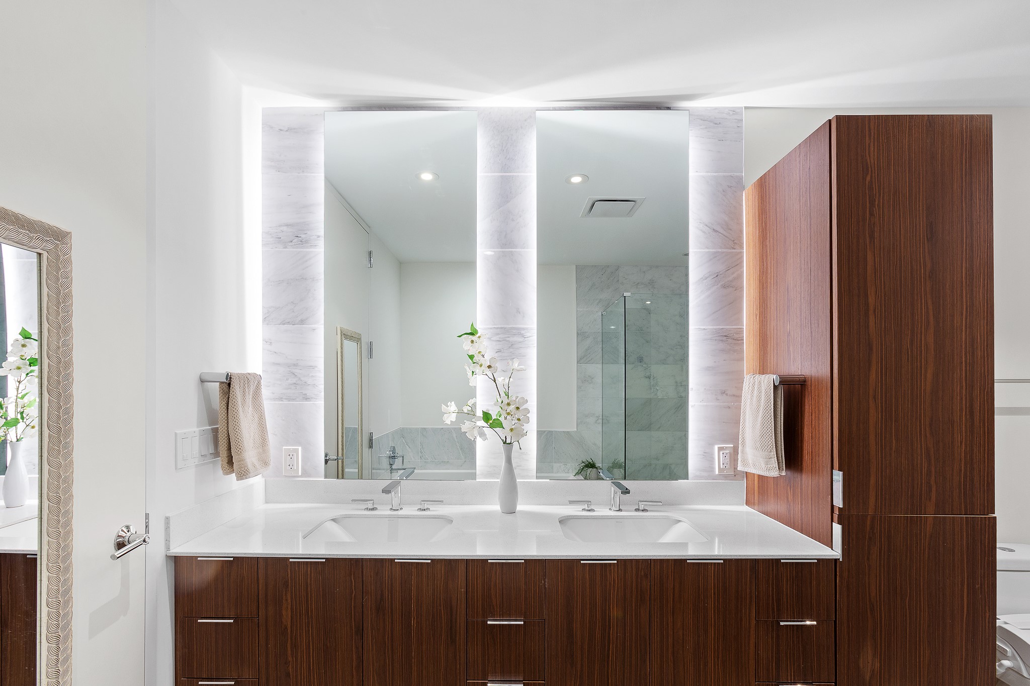 301 West Avenue, Unit 5002 Austin, TX 78701 - Photo 13 of 39 a bathroom with a granite countertop sink and a mirror
