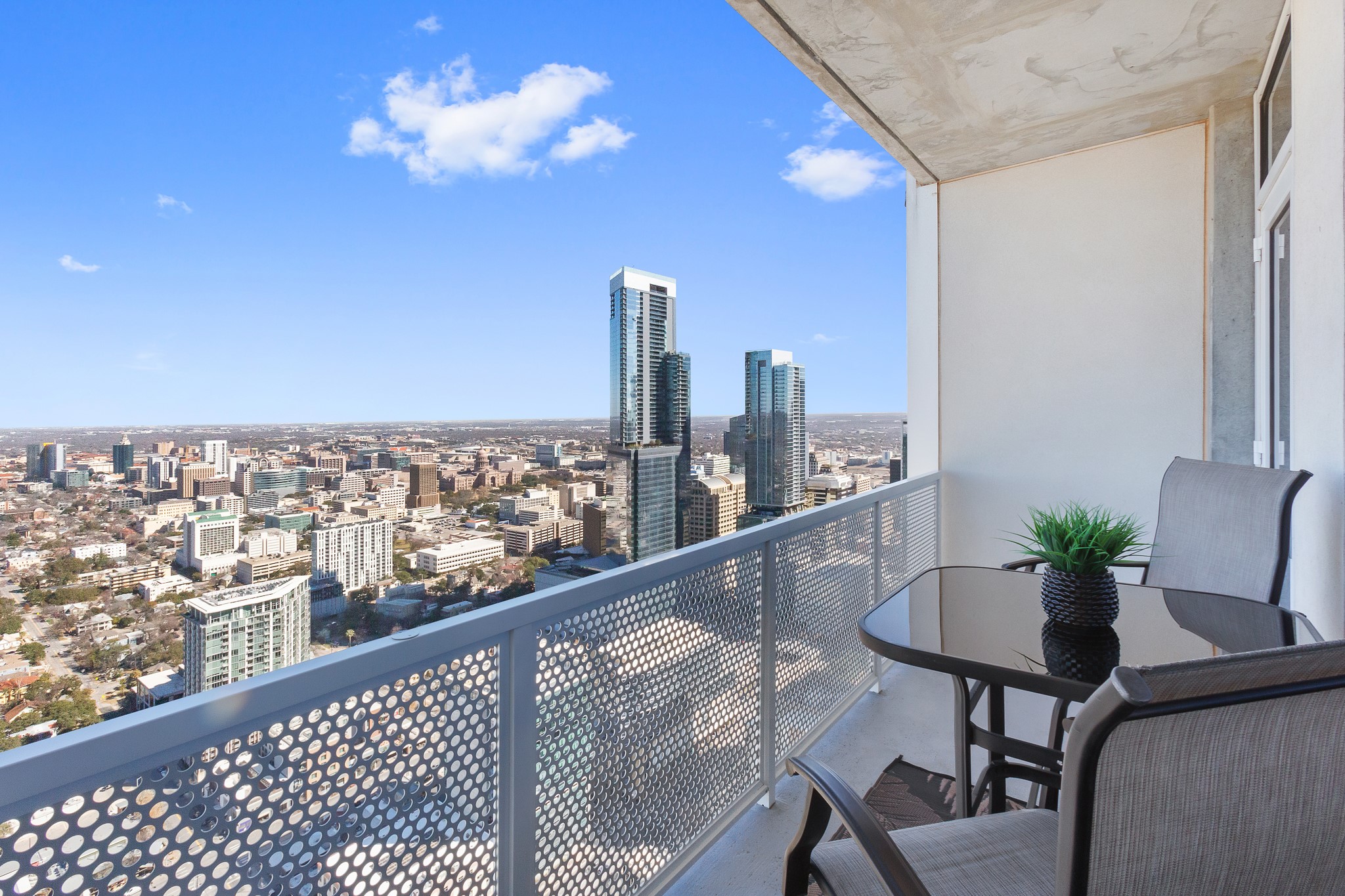 301 West Avenue, Unit 5002 Austin, TX 78701 - Photo 18 of 39 a view of a balcony with furniture