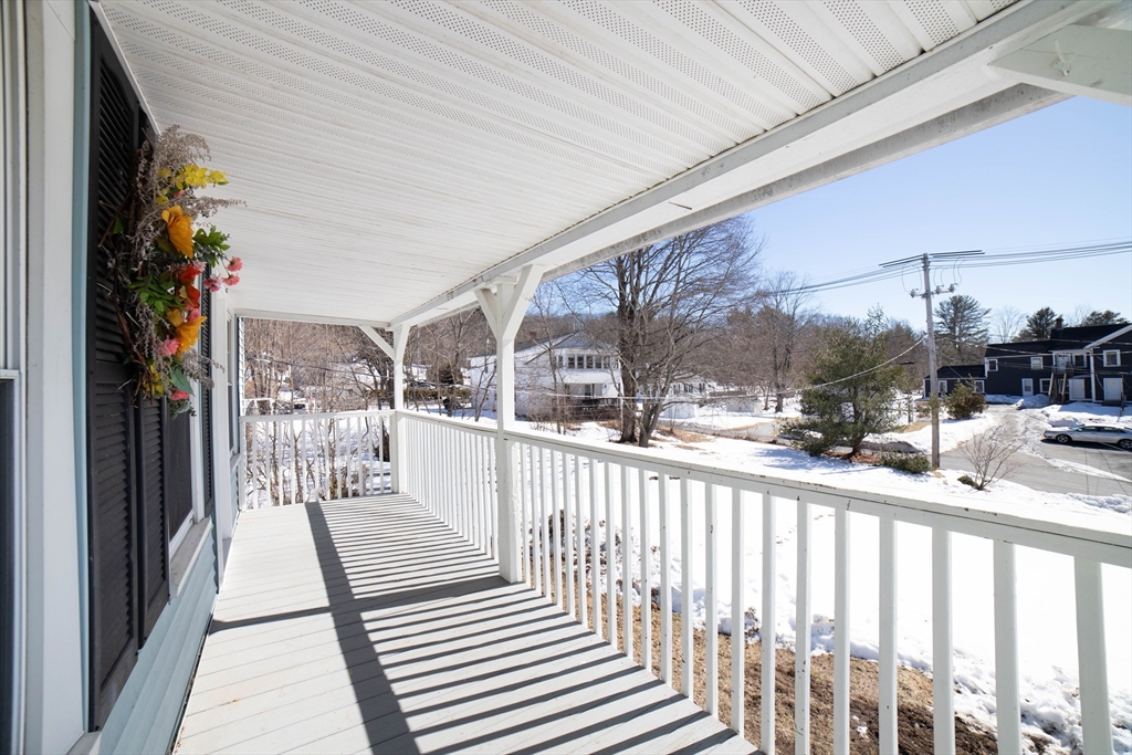 5 Maple Avenue, Unit 2 Oxford, MA 01537 - Photo 8 of 22 a view of a building from a balcony