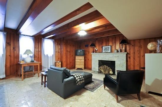 1119 Locust Road Wilmette, IL 60091 - Photo 12 of 25 a living room with furniture and a fireplace