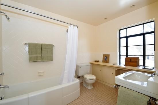 1119 Locust Road Wilmette, IL 60091 - Photo 17 of 25 a bathroom with a sink toilet and shower