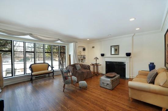 1119 Locust Road Wilmette, IL 60091 - Photo 3 of 25 a living room with furniture and a fireplace
