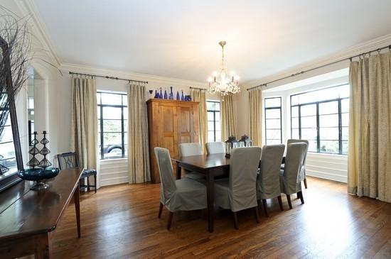 1119 Locust Road Wilmette, IL 60091 - Photo 8 of 25 a view of a dining room with furniture window and wooden floor