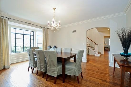 1119 Locust Road Wilmette, IL 60091 - Photo 9 of 25 a view of a dining room with furniture window and wooden floor