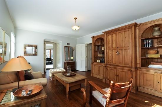 1119 Locust Road Wilmette, IL 60091 - Photo 10 of 25 a living room with furniture a rug and potted plant