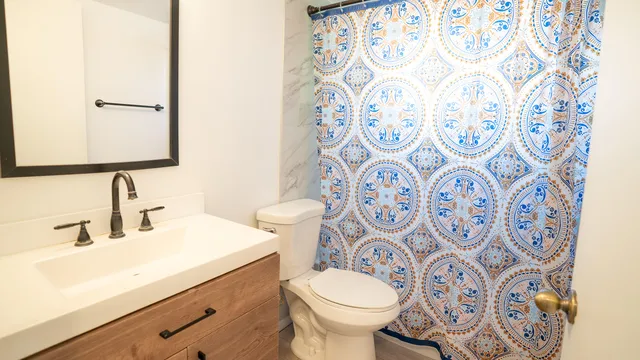 a bathroom with a sink and a toilet