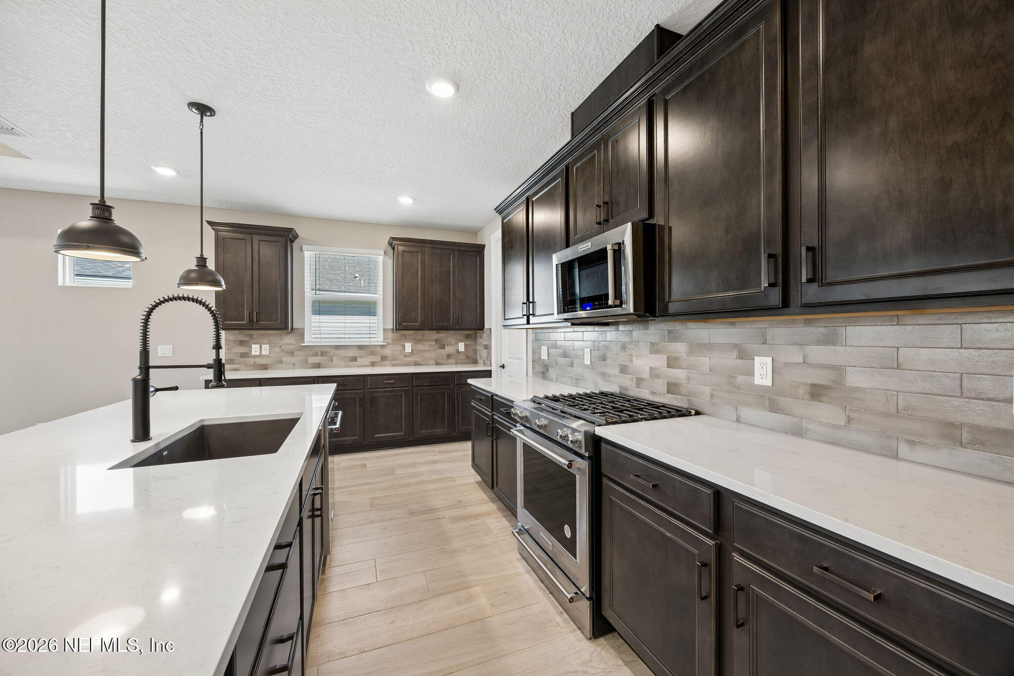 729 Continuum Loop Yulee, FL 32097 - Photo 17 of 55 Thoughtfully laid out kitchen.