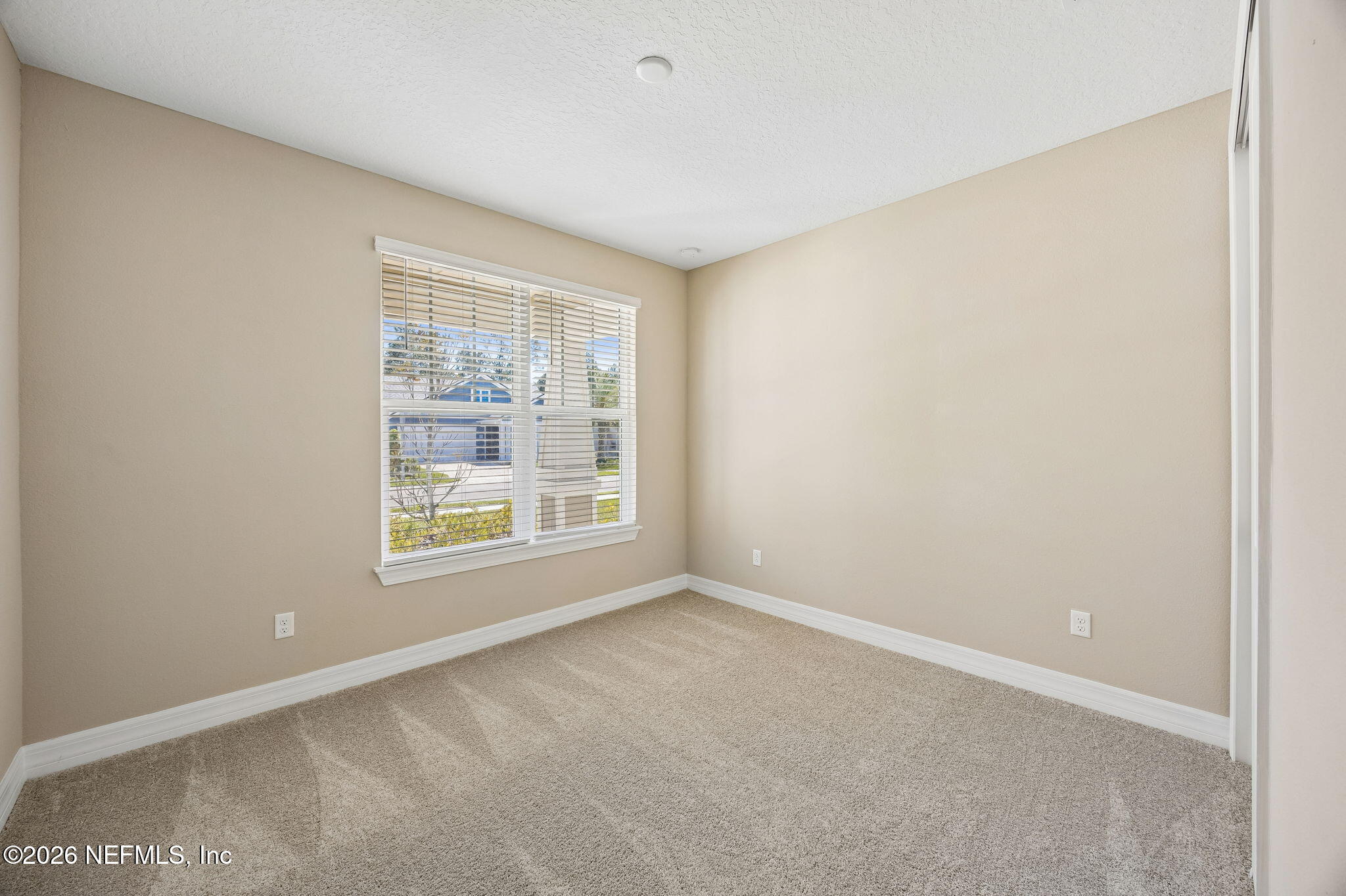 729 Continuum Loop Yulee, FL 32097 - Photo 27 of 55 Private second bedroom.