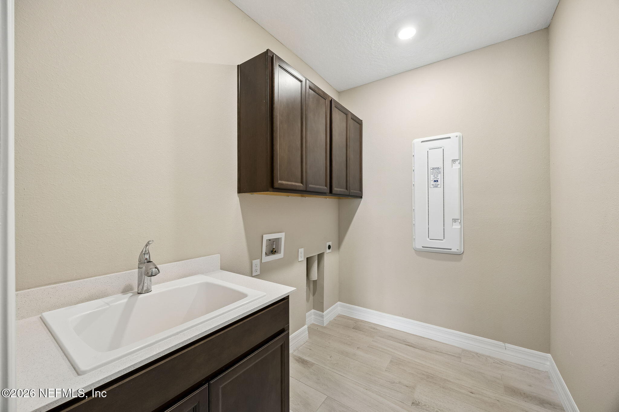 729 Continuum Loop Yulee, FL 32097 - Photo 34 of 55 Well appointed laundry room.