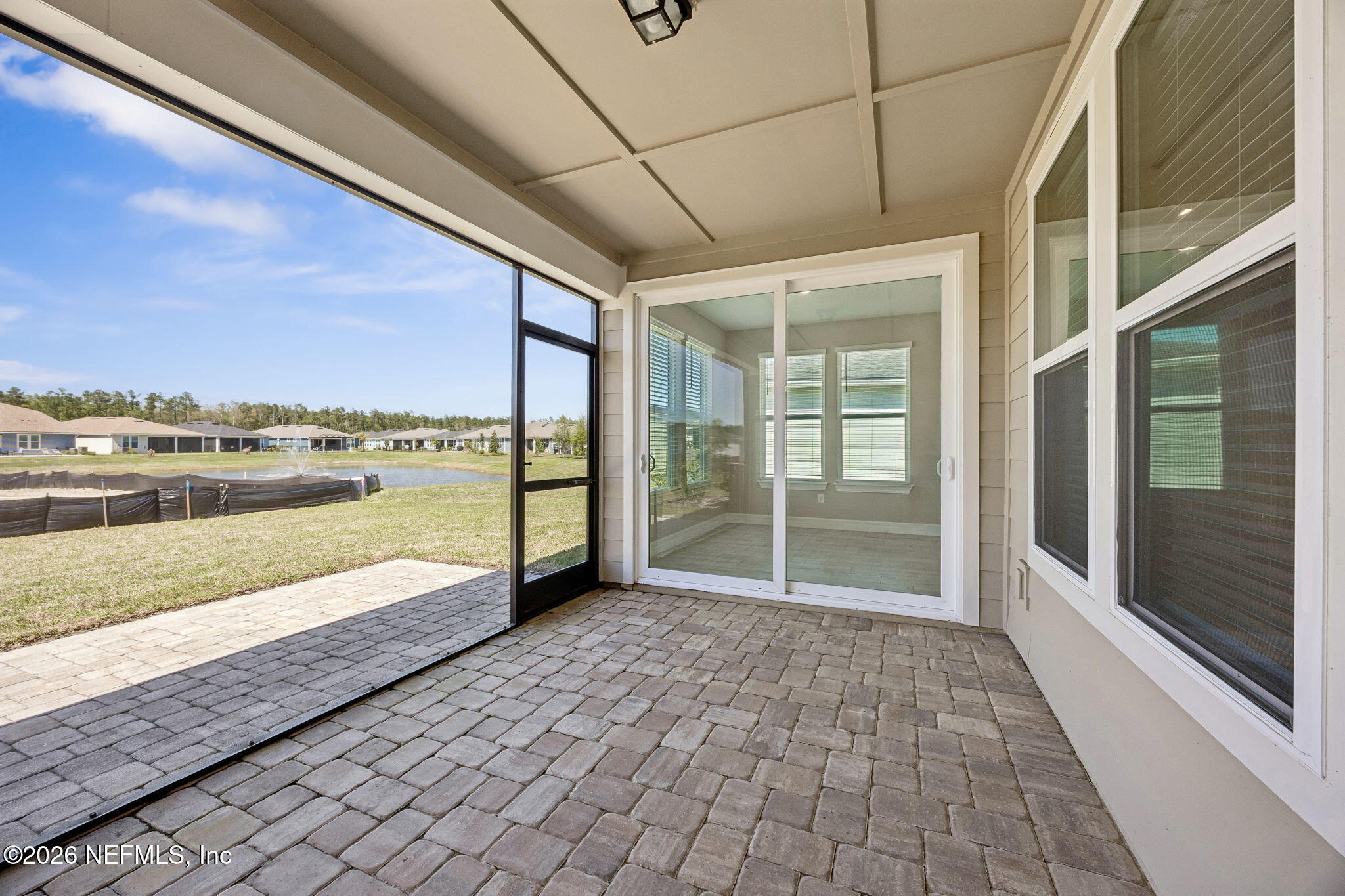 729 Continuum Loop Yulee, FL 32097 - Photo 36 of 55 Relax and enjoy the pond view.