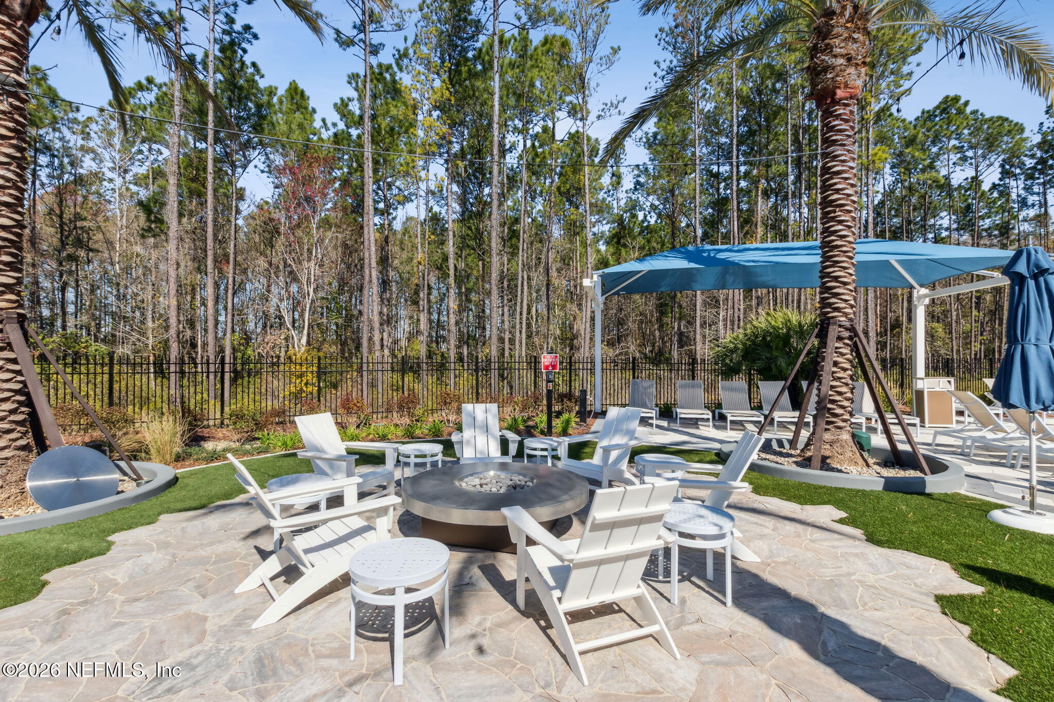 729 Continuum Loop Yulee, FL 32097 - Photo 49 of 55 Cozy time at the firepit.