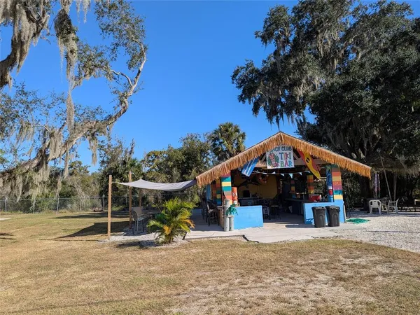 a view of a street with a trees in the background