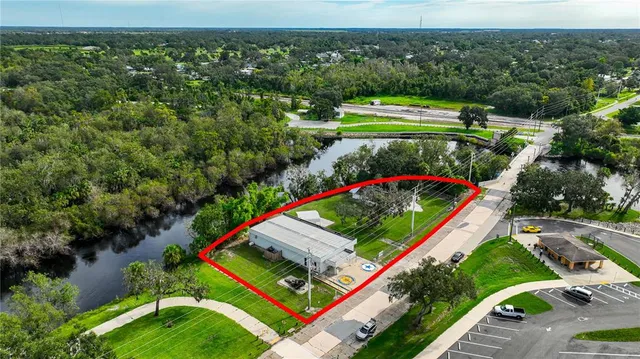 an aerial view of a house with a garden and plants