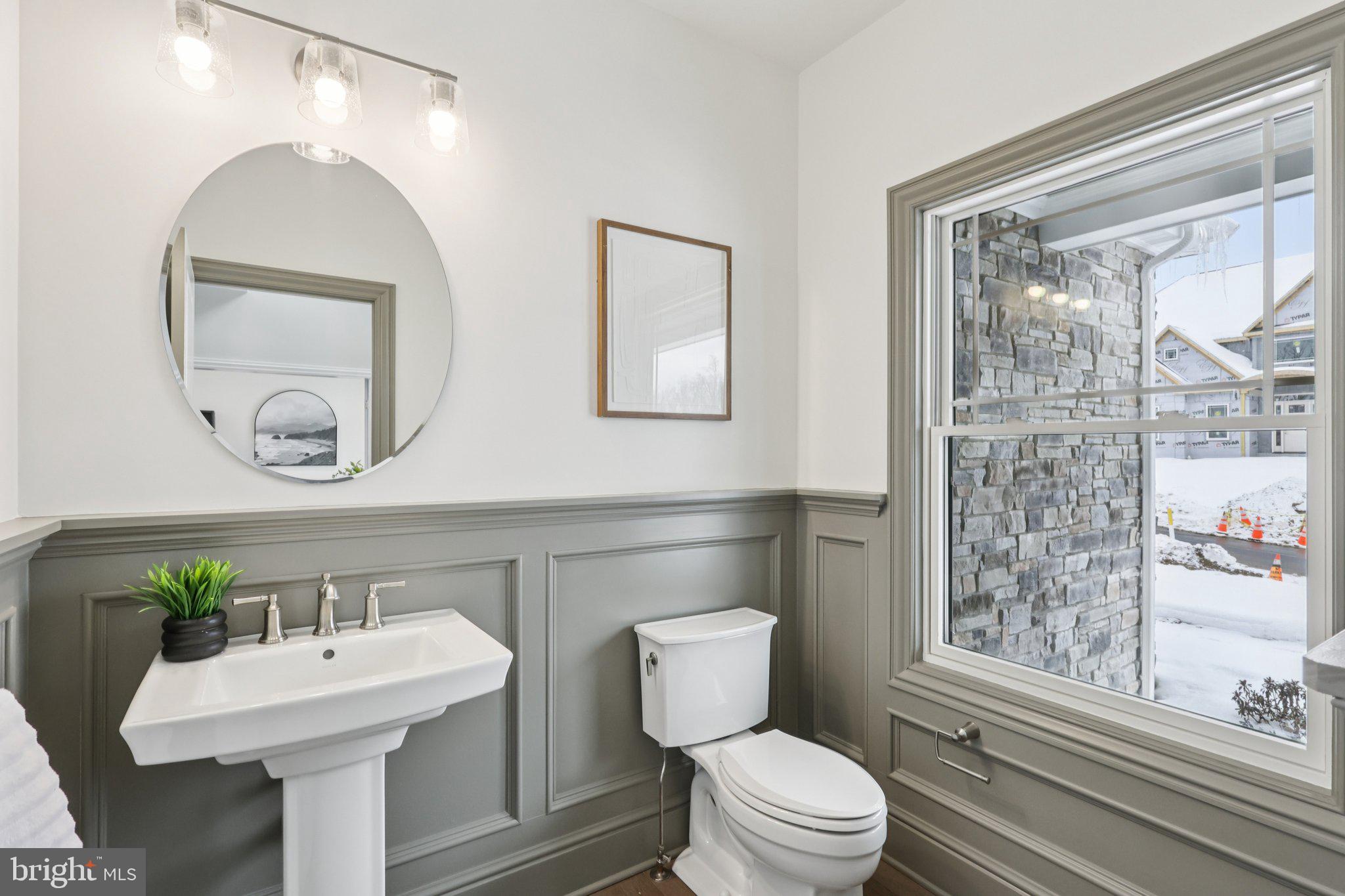 510 Newcomen Road, Unit F1P Exton, PA 19341 - Photo 23 of 56 a bathroom with a sink toilet and a mirror