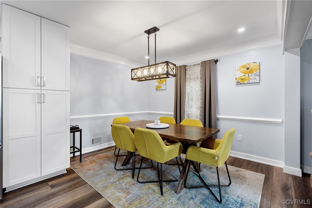 8119 Inca Court North Chesterfield, VA 23237 - Photo 11 of 36 a view of a dining room with furniture and wooden floor