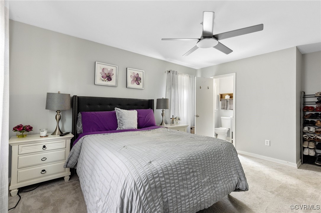 8119 Inca Court North Chesterfield, VA 23237 - Photo 15 of 36 a bedroom with a large bed and a window