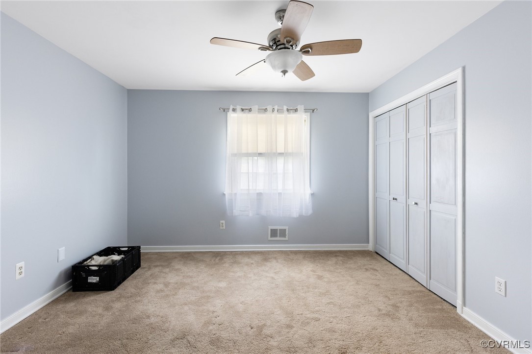 8119 Inca Court North Chesterfield, VA 23237 - Photo 18 of 36 a view of room with a ceiling fan and window