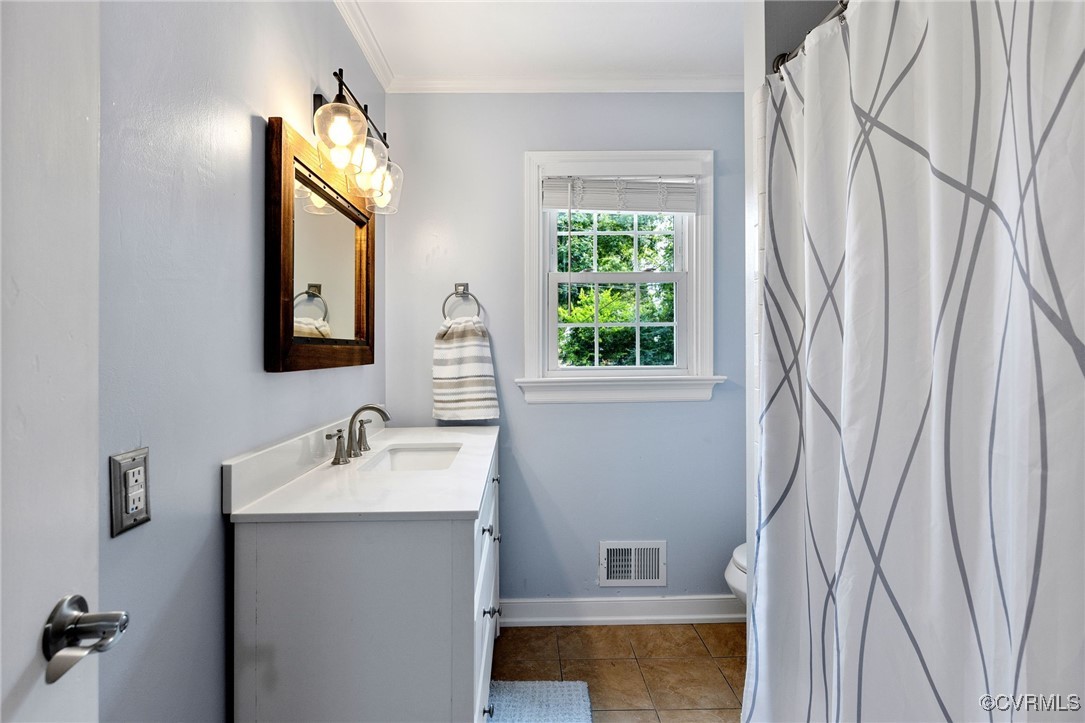 8119 Inca Court North Chesterfield, VA 23237 - Photo 19 of 36 a bathroom with a sink and a mirror
