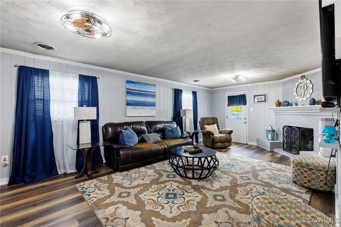 8119 Inca Court North Chesterfield, VA 23237 - Photo 22 of 36 a living room with furniture and a fireplace