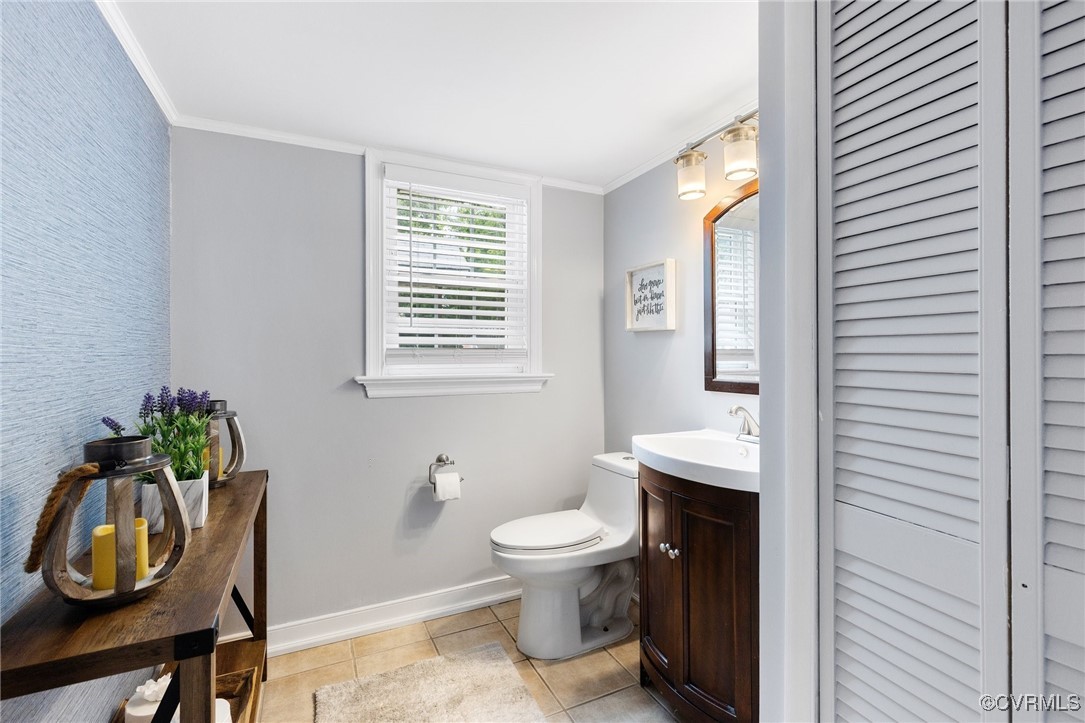 8119 Inca Court North Chesterfield, VA 23237 - Photo 27 of 36 a bathroom with a toilet a sink and a mirror