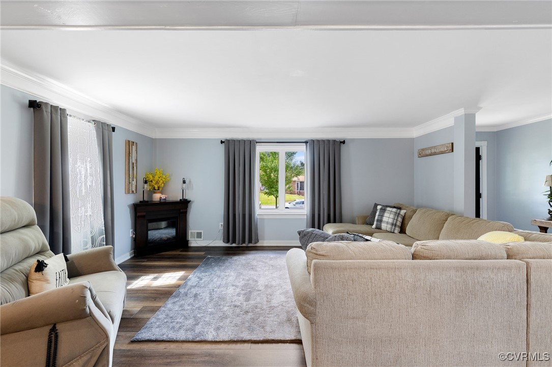 8119 Inca Court North Chesterfield, VA 23237 - Photo 5 of 36 a living room with furniture and a fireplace
