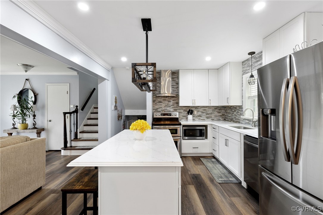 8119 Inca Court North Chesterfield, VA 23237 - Photo 9 of 36 a kitchen with sink a refrigerator and chairs