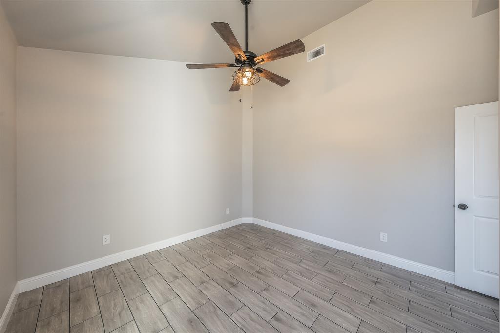 112 Stevens Street Bridgeport, TX 76426 - Photo 20 of 37 a view of a room with wooden floor