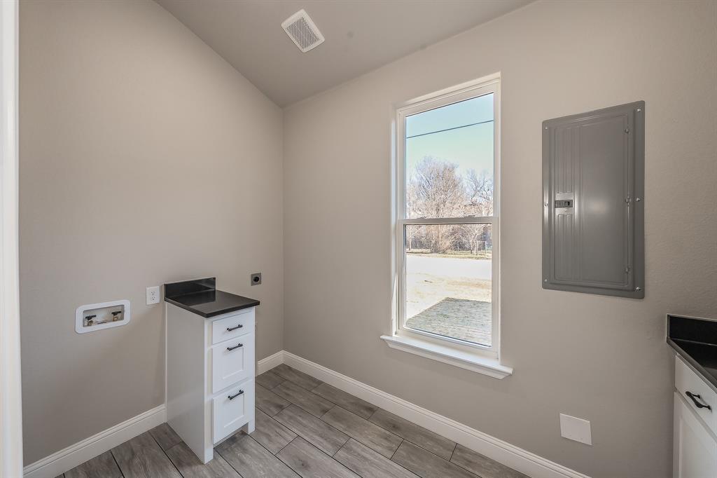112 Stevens Street Bridgeport, TX 76426 - Photo 22 of 37 a bedroom with a bed and a window