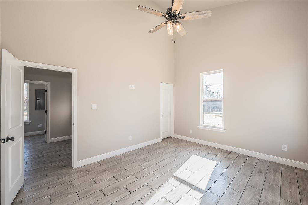 112 Stevens Street Bridgeport, TX 76426 - Photo 25 of 37 a view of an empty room with a window