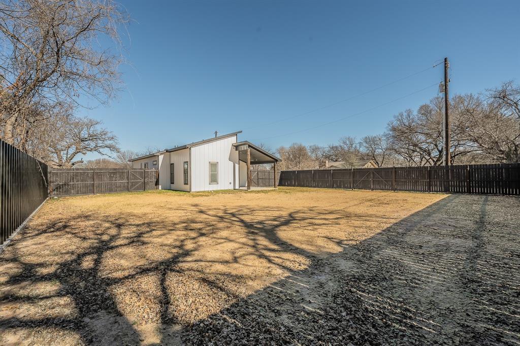 112 Stevens Street Bridgeport, TX 76426 - Photo 36 of 37 a bathroom with a sink and mirror