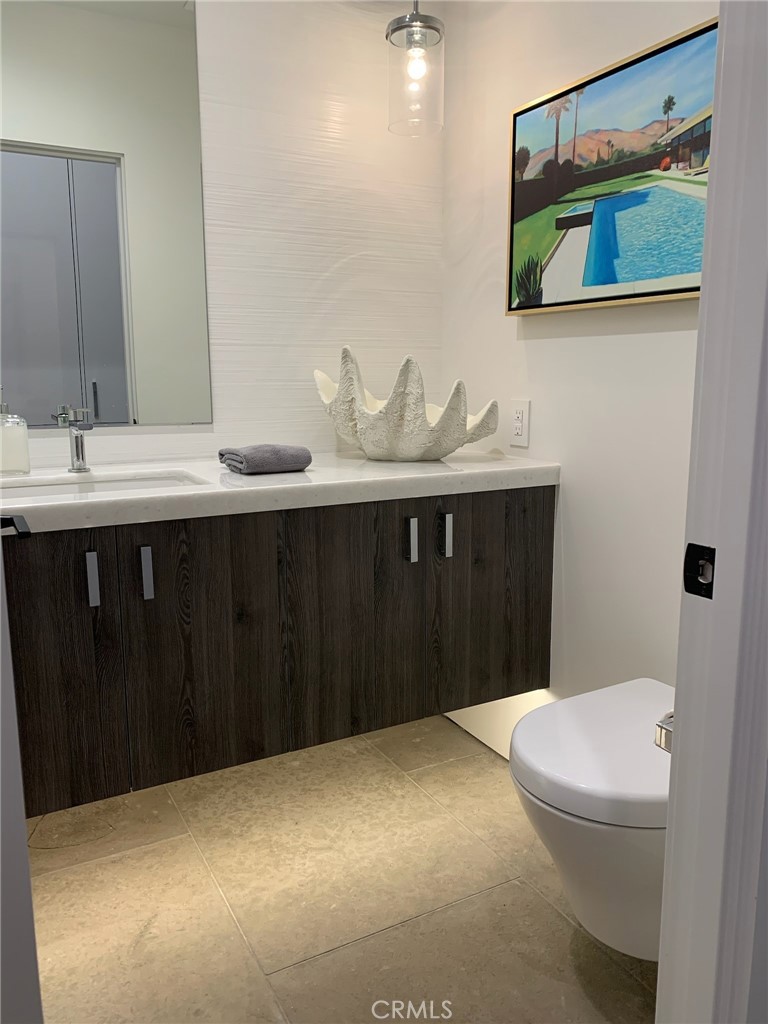 809 Emerald Bay Laguna Beach, CA 92651 - Photo 29 of 31 a bathroom with a sink and a toilet