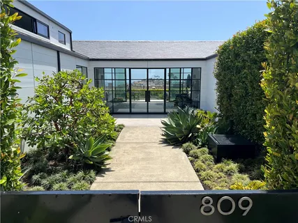a view of entrance gate of the house and garden