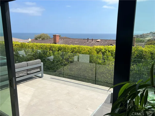 a view of a yard with an outdoor seating