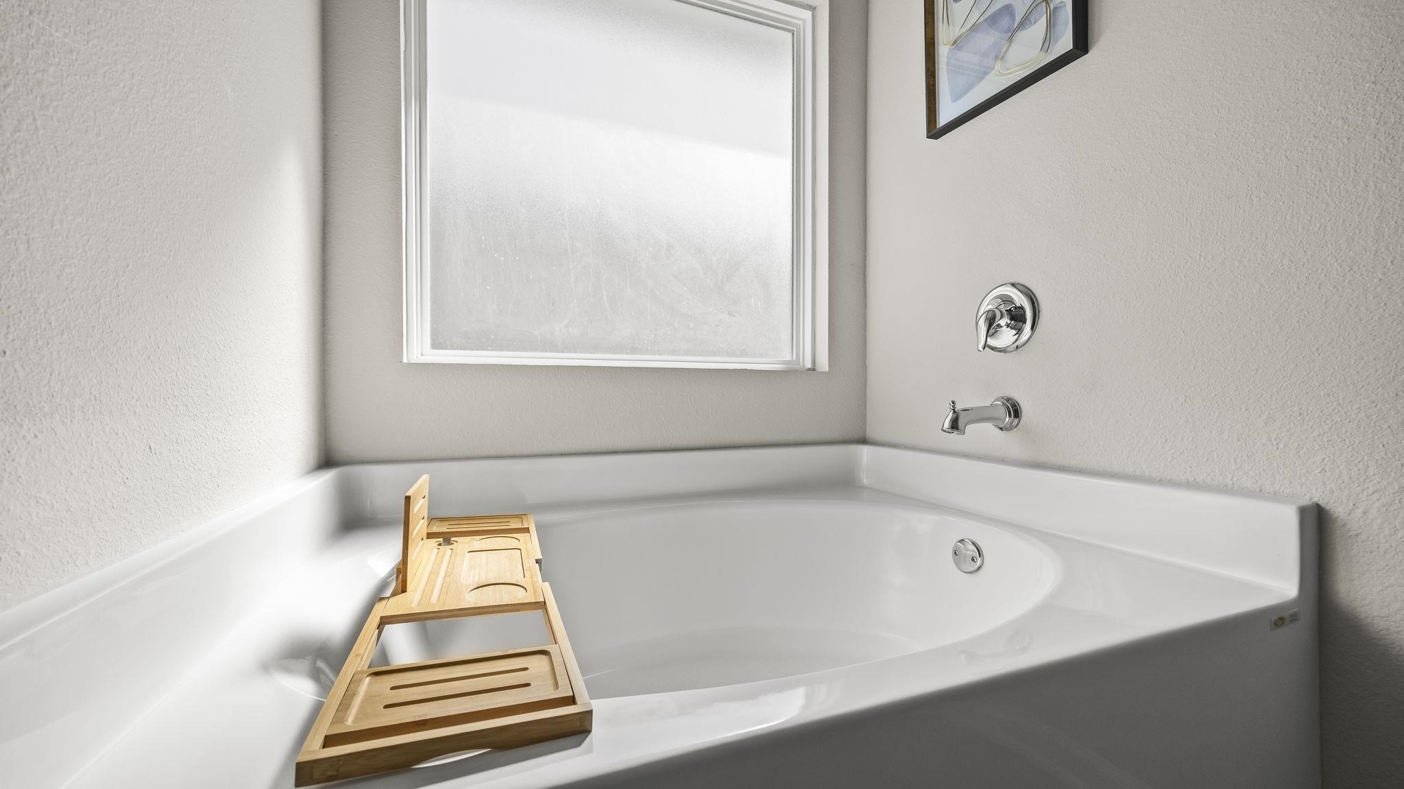 224 Burnston Way Foley, AL 36535 - Photo 33 of 42 Bathroom with a textured wall and a garden tub