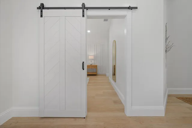 a view of a room with air conditioner and a window