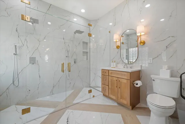 a bathroom with a bathtub and a shower