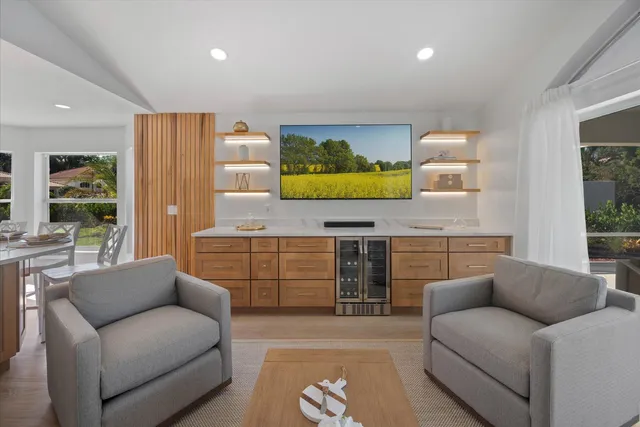 a living room with furniture and a window