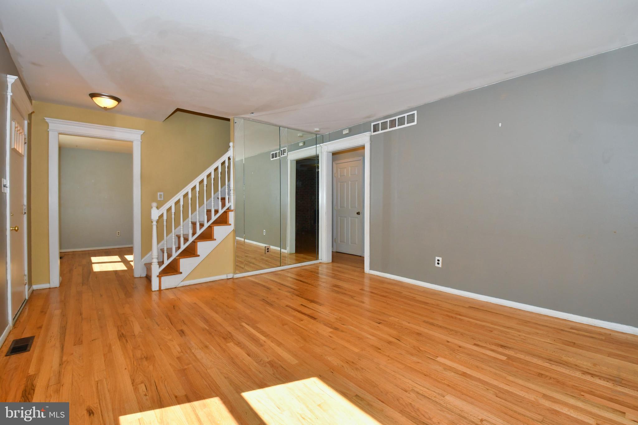 4704 Ebenezer Road Nottingham, MD 21236 - Photo 2 of 56 a view of an empty room with wooden floor