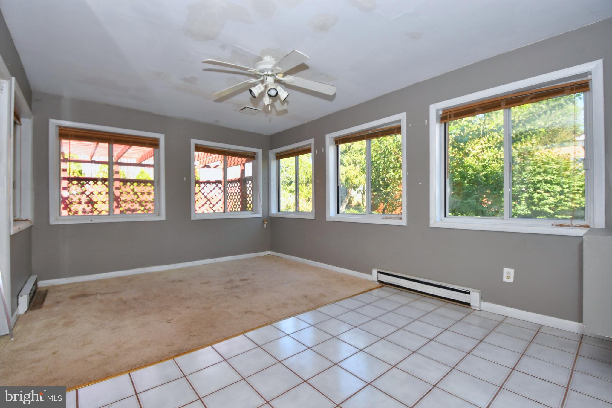 4704 Ebenezer Road Nottingham, MD 21236 - Photo 14 of 56 a view of an empty room with a window