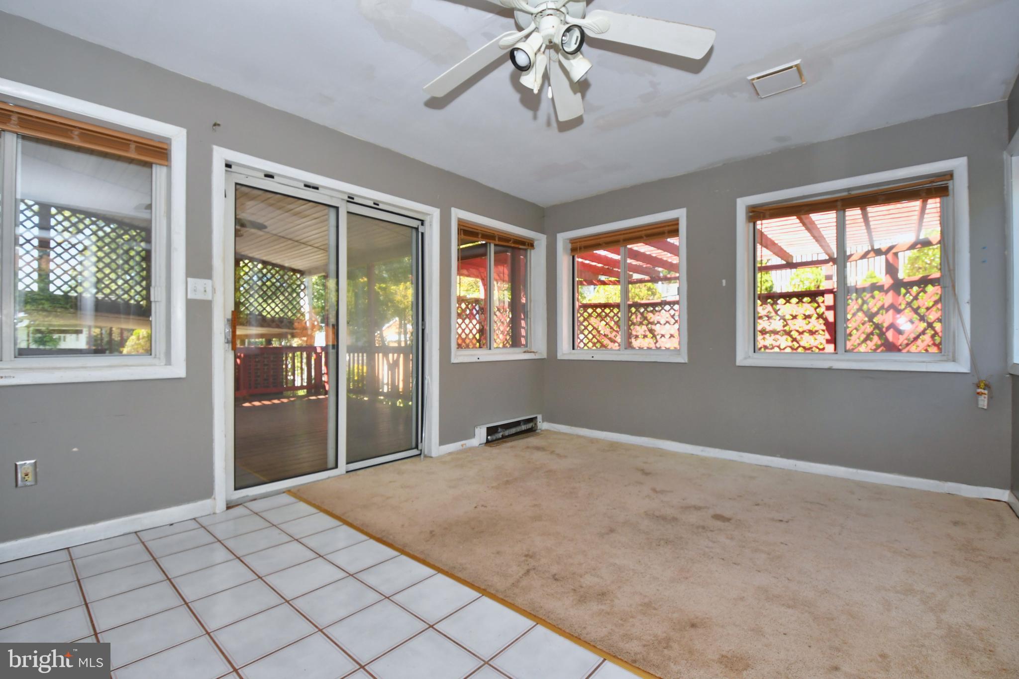 4704 Ebenezer Road Nottingham, MD 21236 - Photo 16 of 56 a view of an empty room with a window